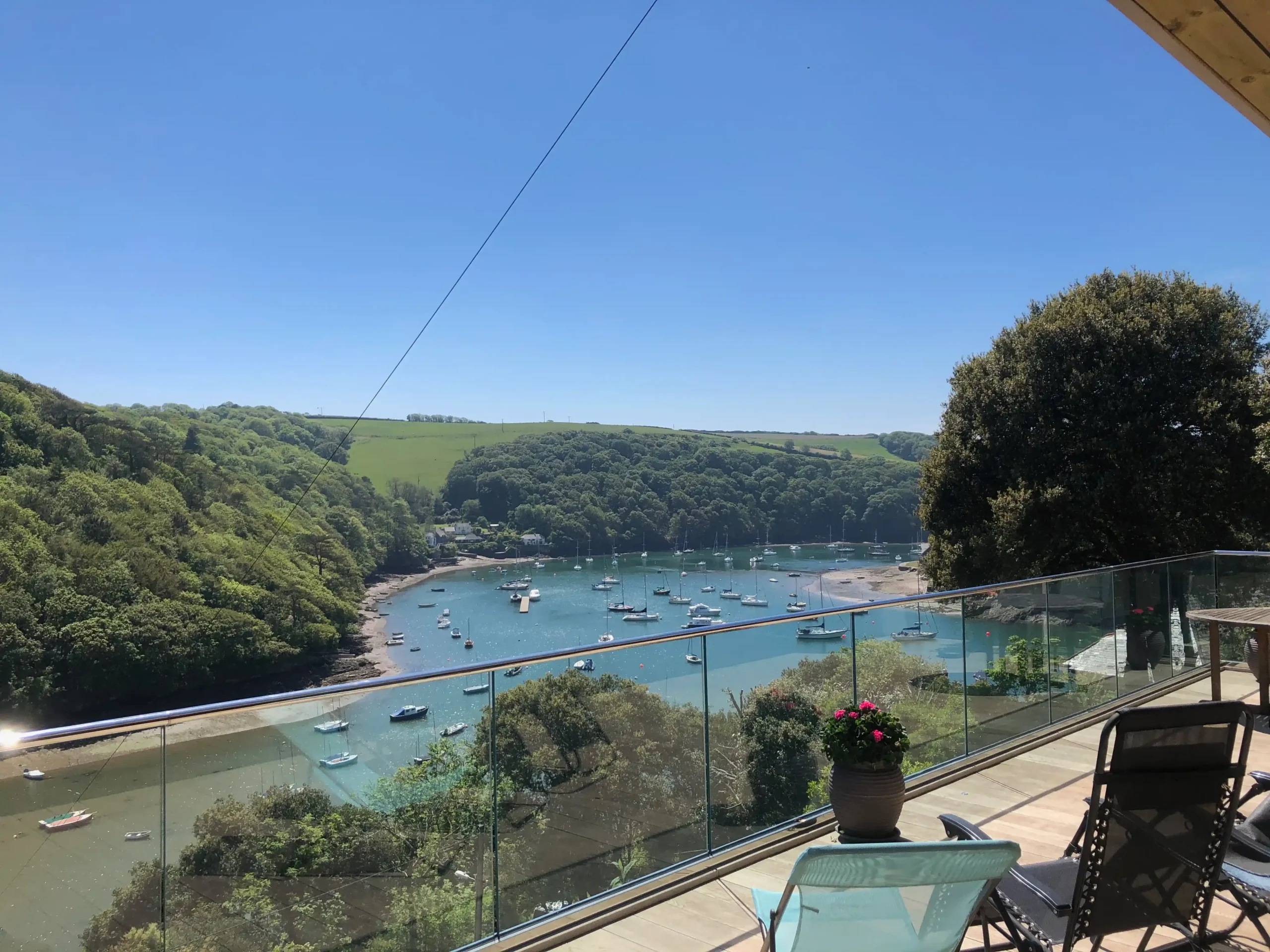 River Yealm view from modern balcony transformation - Divine Developments Building Services